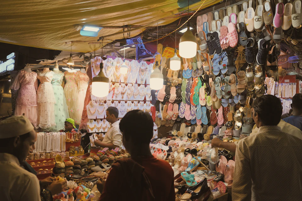 People standing outside a shop