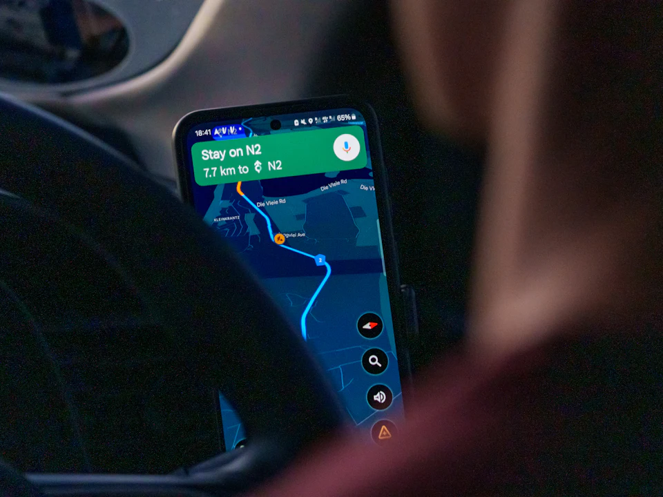 Person checking a map app on a smartphone