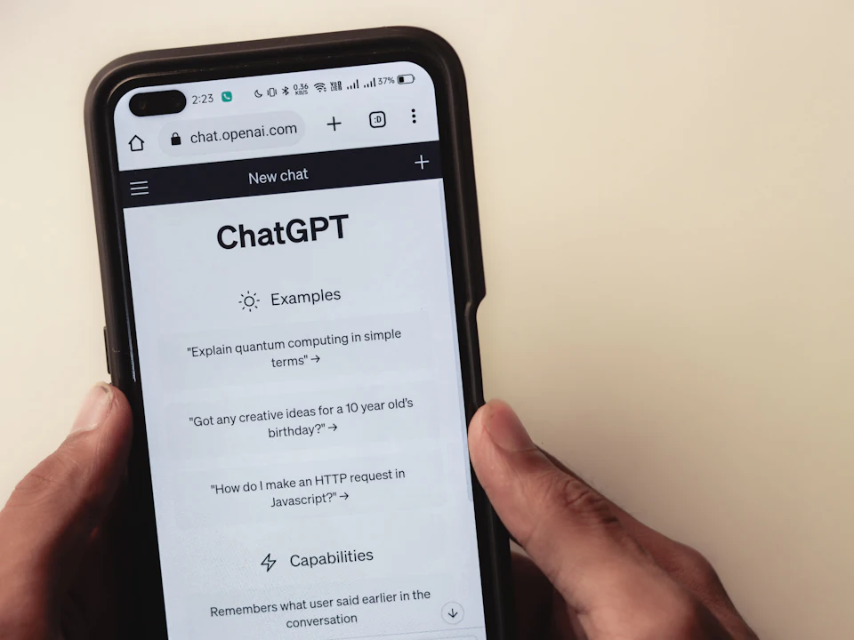 Person reading a chat message on a smartphone