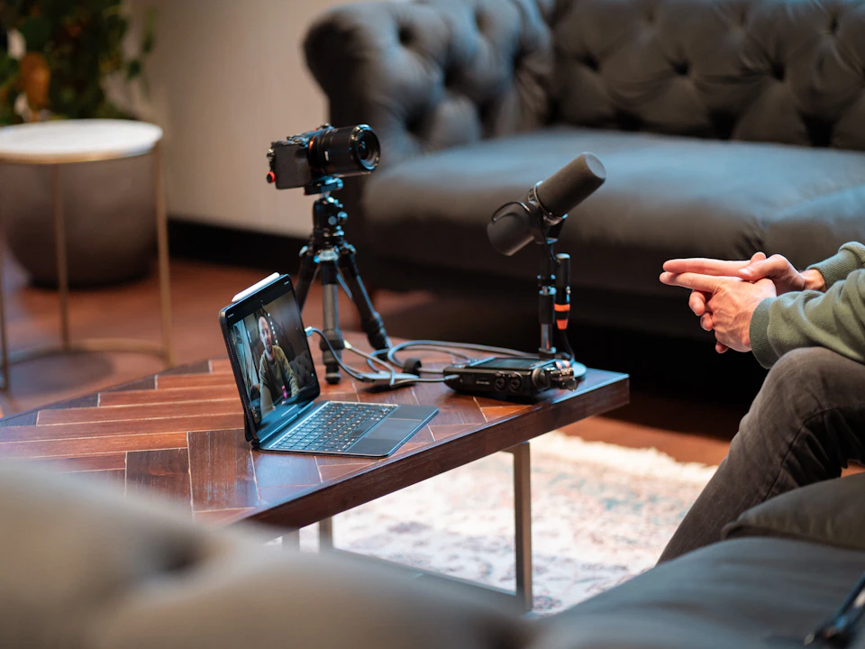 Camera, microphone and laptop set up for recording a video